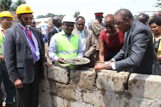 His Excellence, President Uhuru Kenyatta, laying the foundation stone for the Wangari Maathai Institute Campus