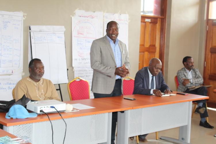 Prof. Ndichu Maingi (Dean Faculty of Veterinary Sciences) making closing remarks at the just concluded mediation training workshop. He was representing the Ag. Principal College of Agriculture and Veterinary Sciences. On his left is Prof. David Mungai, Director, WMI, Dr. Thuita Thenya and on his right is Prof. R. Wahome. 