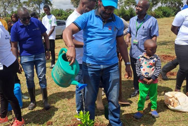Director WMI Prof. Thenya plants a tree on Mazingira Day