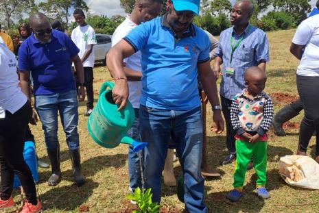 Director WMI Prof. Thenya plants a tree on Mazingira Day